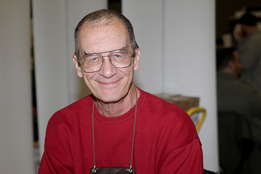 Bernie smiling towards camera