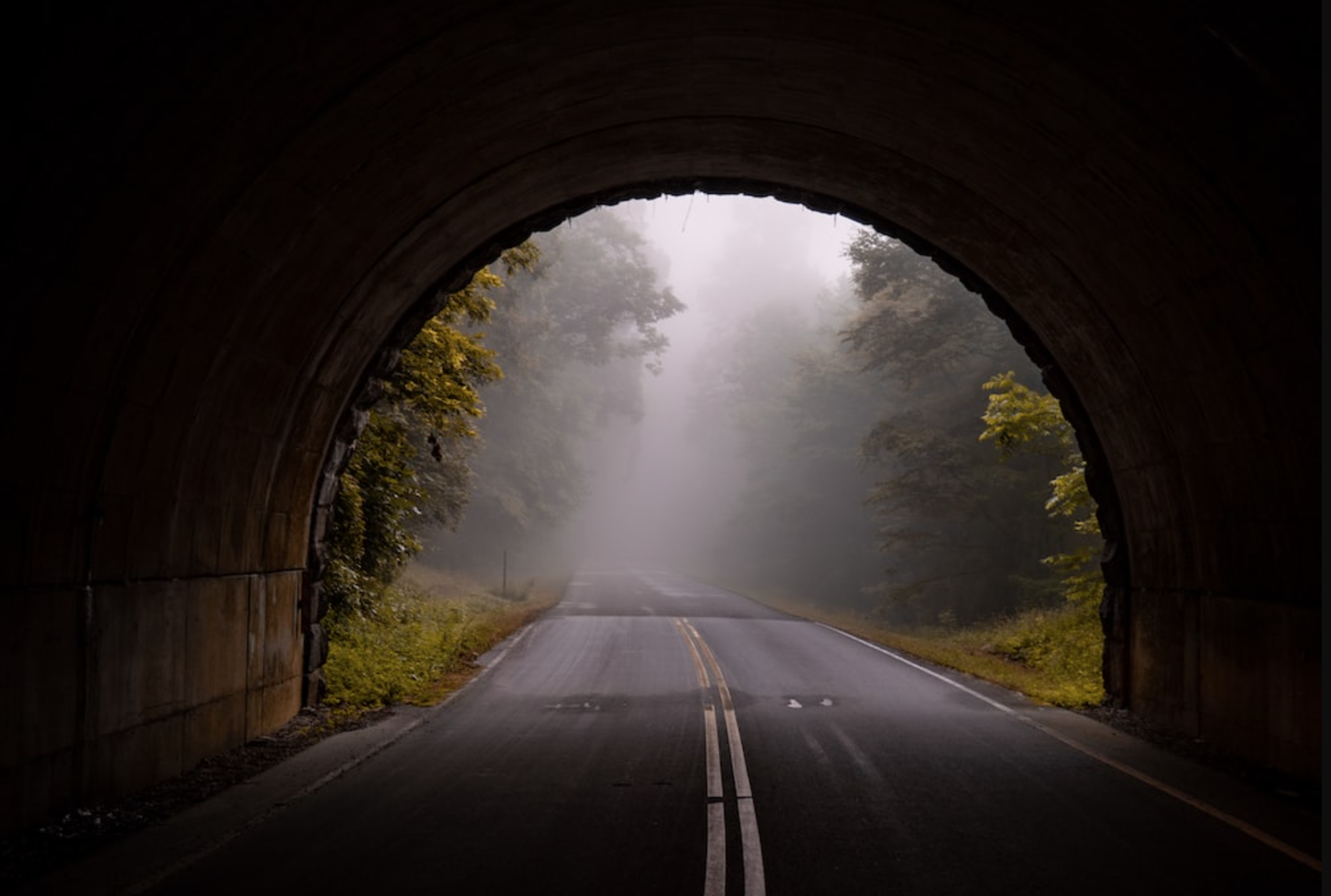 A painting Wil E Coyote did of a photorealistic tunnel